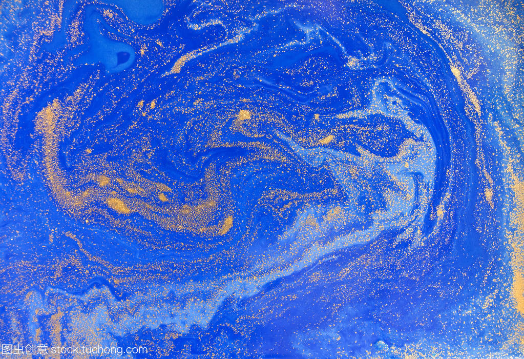 蓝色和金色的液体纹理。水彩手绘大理石纹图。油墨大理石背景
